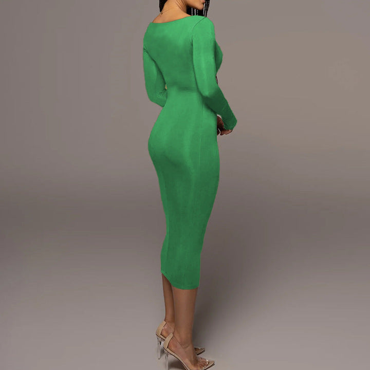 Bright green, form-fitting long-sleeved midi dress with a high neckline.